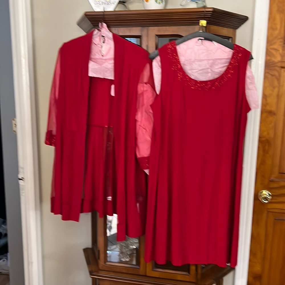 Beautiful red dress with jacket. Worn one for four hours. Dry cleaned.